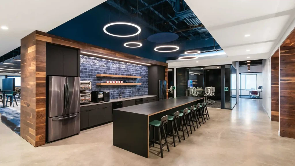 Contemporary kitchen area with circular LED pendants
