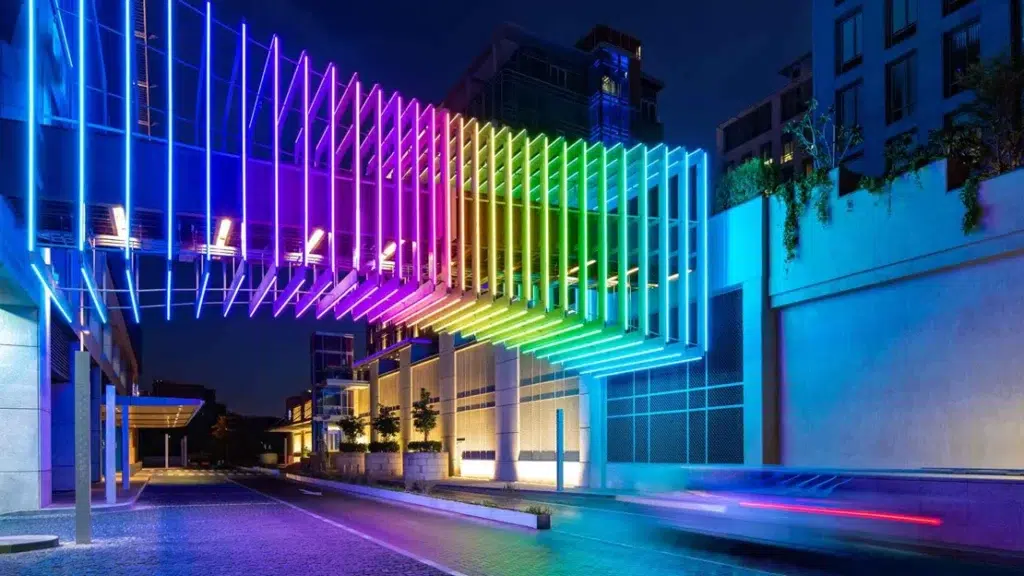 nphis-led-strip-architectural-facade-building-night » led strip light Production R&D Manufacturer|NPHIS Architectural facade LED strip lighting on modern commercial building showing colorful RGB LED light strips outlining building structure at night