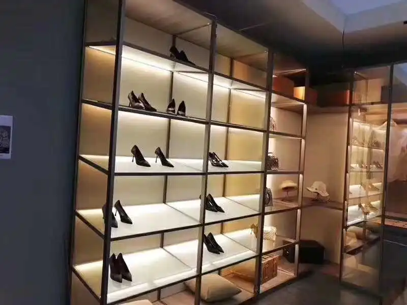 High-end retail shoe display shelves perfectly illuminated by uniform shelf LED rigid bars from a reliable LED strip factory in China