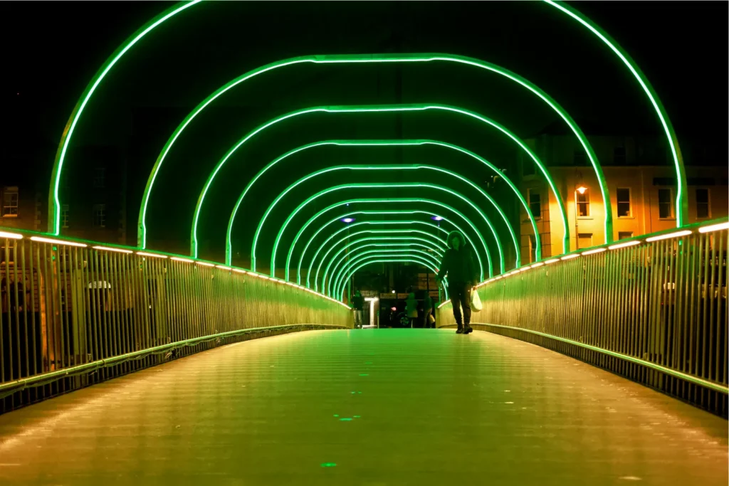 Outdoor LED neon arch lighting installation showing waterproof flexible LED light source for commercial architectural projects