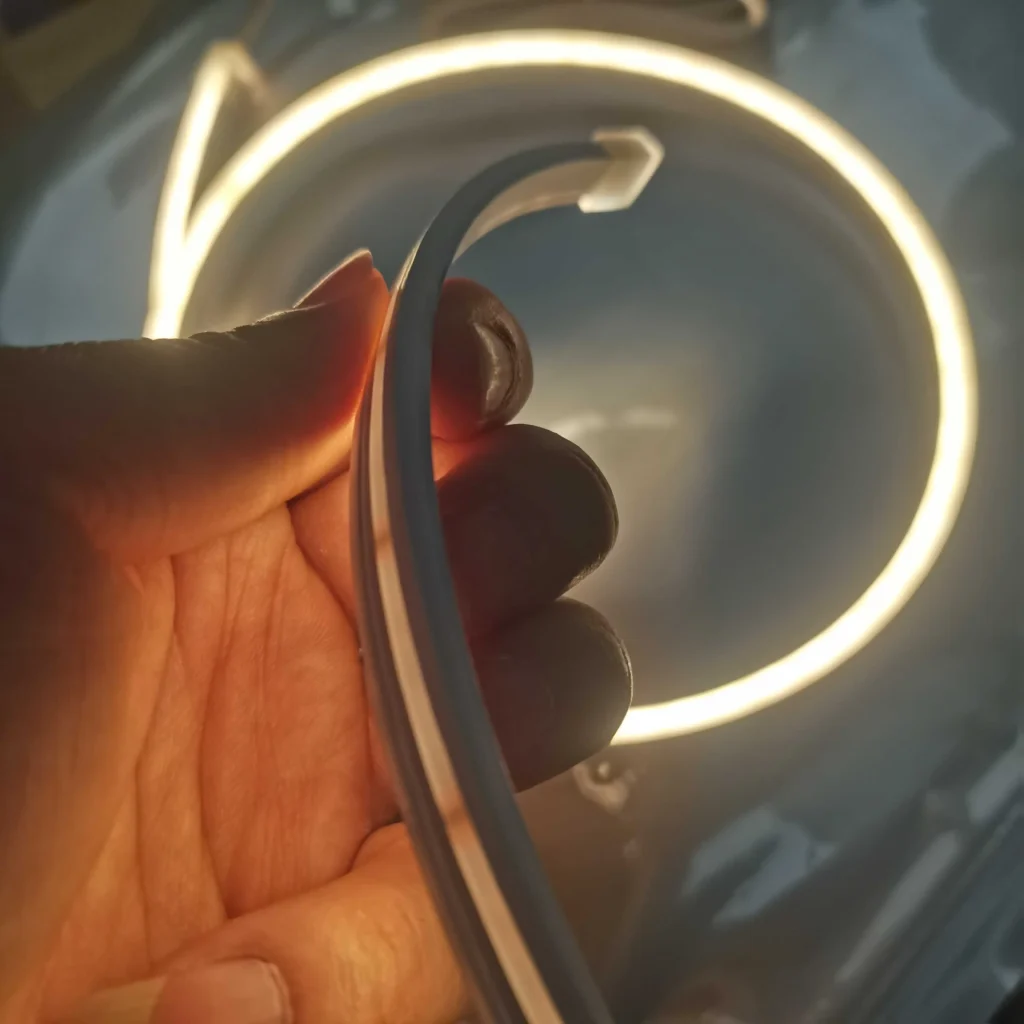 IP67 silicone LED neon flex warm white narrow strip anti-yellowing silicone LED strip UV resistant outdoor architectural linear lighting hand demonstration