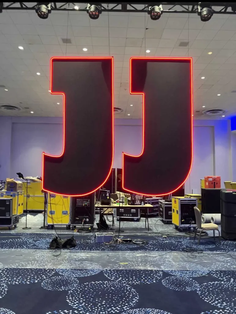 custom-led-neon-sign-dmx-event-lighting-setup » Custom LED Strip Lights Manufacturer | Silicone Neon Flex Supplier China » Custom LED Strip Lights Manufacturer | Silicone Neon Flex Supplier China Custom LED neon sign installation for event stage lighting controlled by standard DMX decoders.