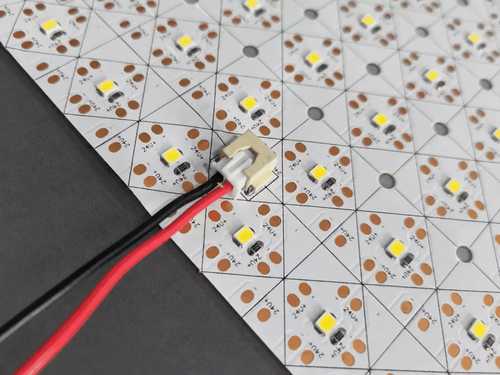 24V flexible led light sheet 2pin connector wiring close‑up，easy‑install backlit led sheet terminal connection